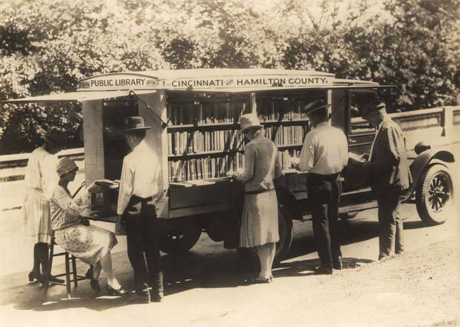 Adults_browsing_at_a_bookmobile_for_Cincinnati_and_Hamilton_County_in_Ohio