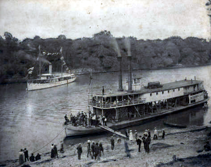 Coast Guard cutter "Winona" and steamboat "Minnie Lee" transporting people from Mobile to attend the centennial celebration of the founding of St. Stephens, Alabama