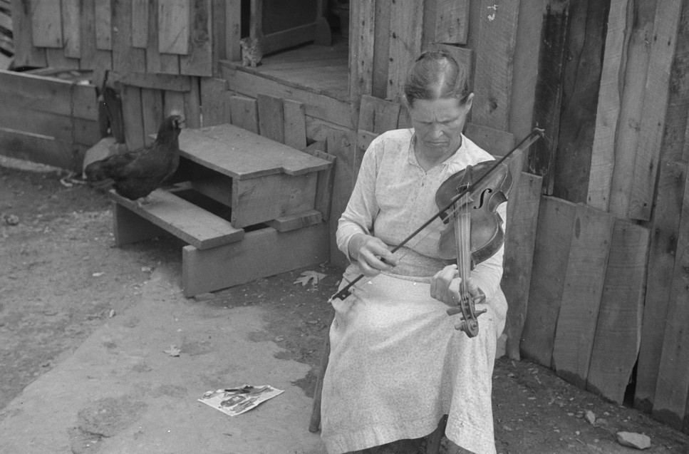 Skyline Farms - Mrs. Mary Mclean and chicken and cat