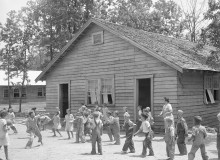 PATRON + Could you sit on these hard benches with no backs for long hours in school? [1936 Photographs & film] – Skyline Farms – Part 4 –