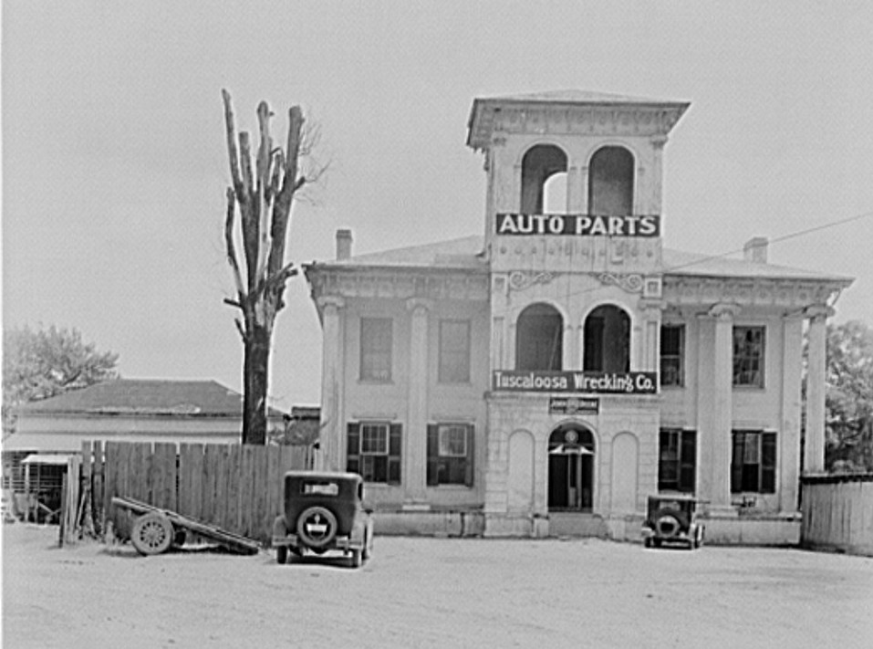 Converted antebellum residence into Tuscaloosa Wrecking Company and Auto Parts. Alabama