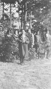 Ninthgrade_students_at_Calhoun_Colored_School_in_Lowndes_County_Alabama_collecting_Christmas_greenery_with_their_teacher_Mrs_Evans