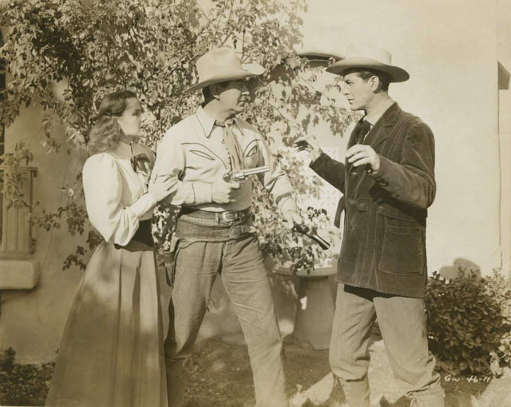 Johnny_Mack_Brown_performing_in_a_western_movie