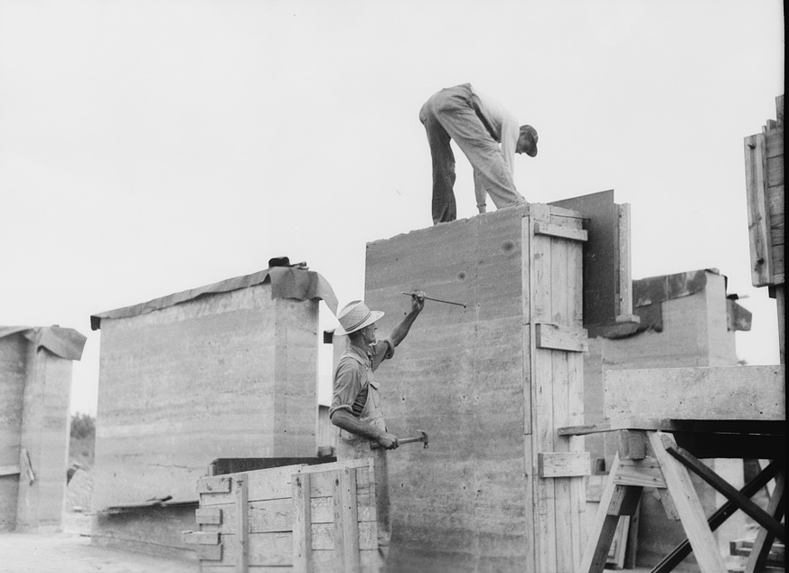 Rammed earth construction near Birmingham, Alabama. The bolts are removed and the holes plugged with mortar