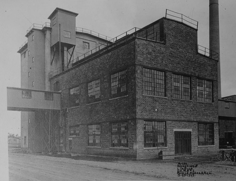 VIEW LOOKING S.E. AT THE LIME-NITROGEN SILO AND HYDRATING BUILDINGS. MAY 29, 1919