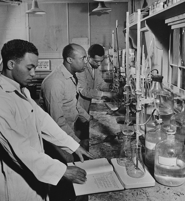 (left to right) Paul L. Imes, Samuel C. Watkins, and George W. Richardson are employed as laboratory technicians by TVA at its plant 1942
