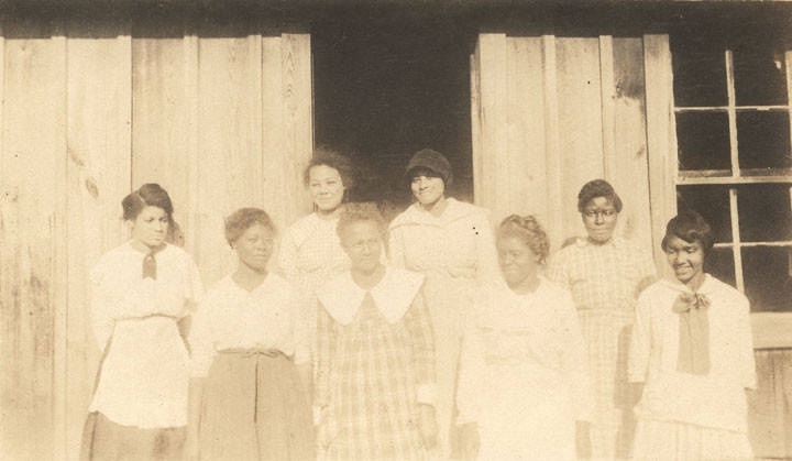 Eight young African American women outside a school building in Bibb County, Alabama ca. 1910-1915 Q8723