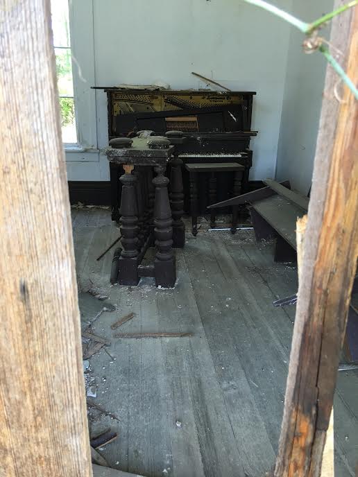 Antique piano inside the remains of Good Hope Baptist (Amanda Gallatin)