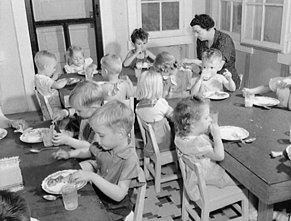 Childersburg, Alabama. Lunch period in the WPA day nursey for defense workers' children, May 1942 (John Collier, LOC)